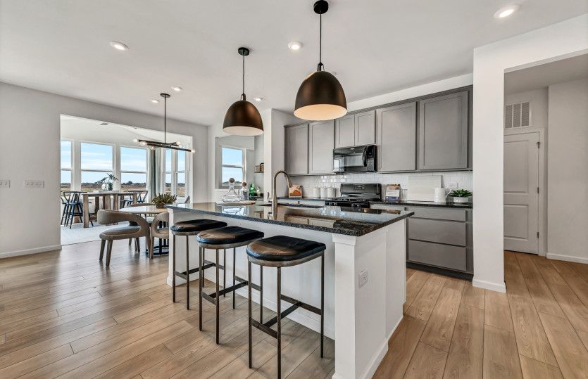 Kitchen with Large Island and Pendant Lighting