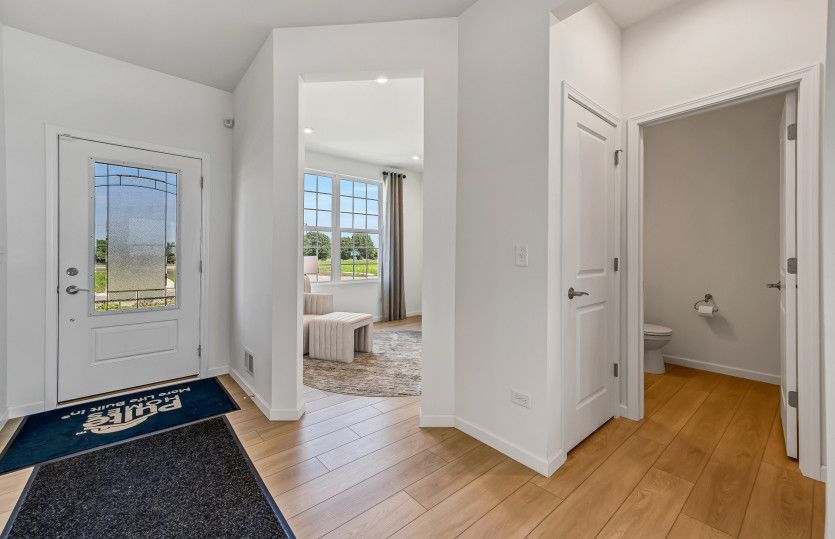 View of Flex Room and Power Room from Foyer