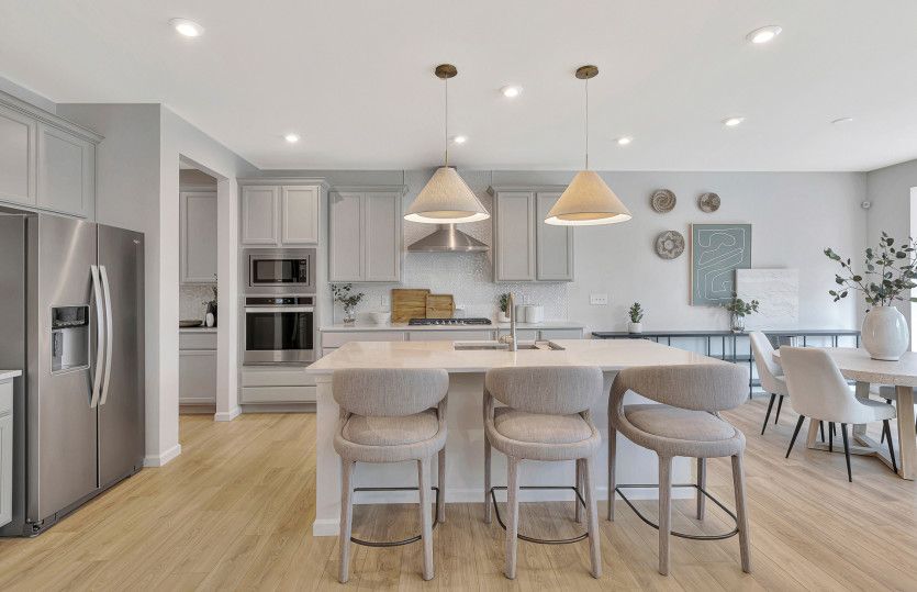 Kitchen with Pendant Lighting and Stainless Steel Appliances