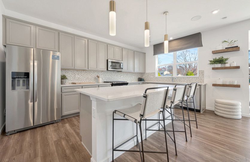 Kitchen with Pendant Lighting and Stainless Steel Appliances