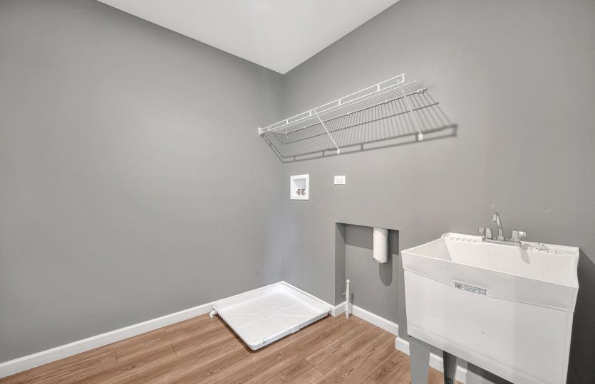 Laundry Room with Utility Sink and Shelving