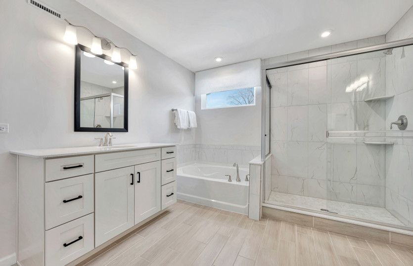 Spa-Like Owner's Bath with Dual Vanity and Separate Tub/Shower