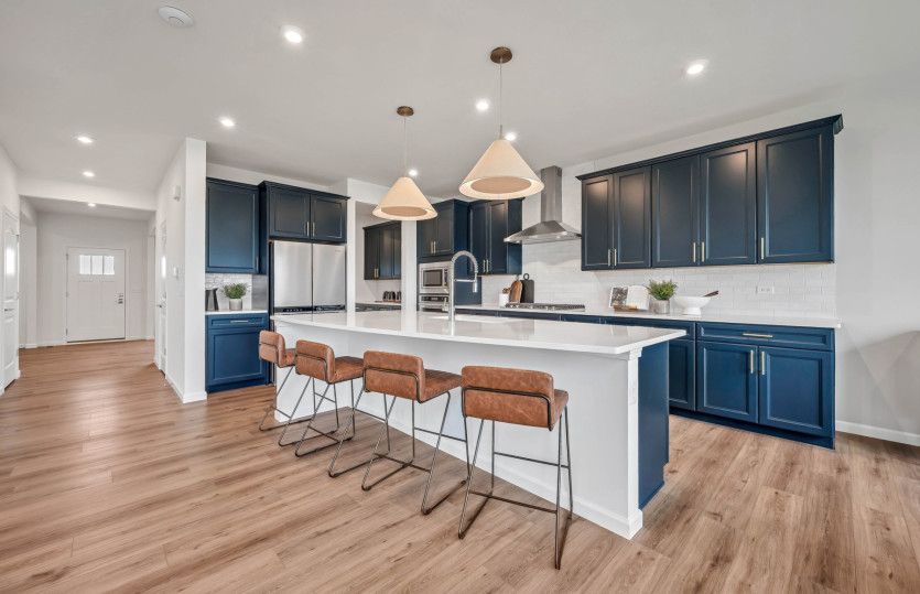 Kitchen with Pendant Lighting Over Island