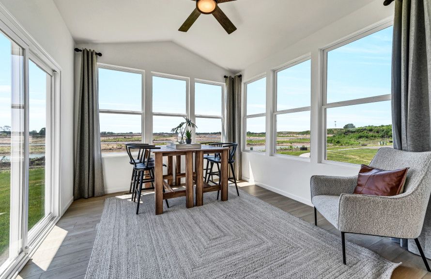 Add a Window-Wrapped Sunroom