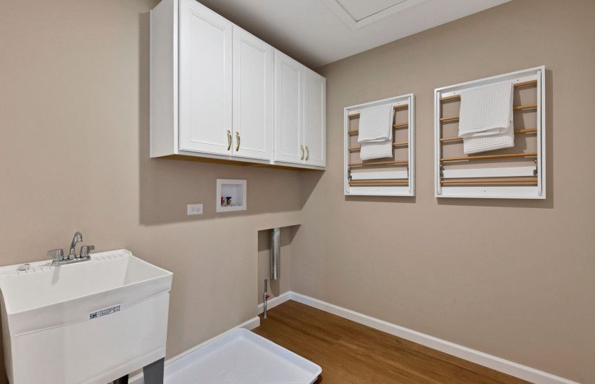 Laundry Room with Utility Sink and Storage