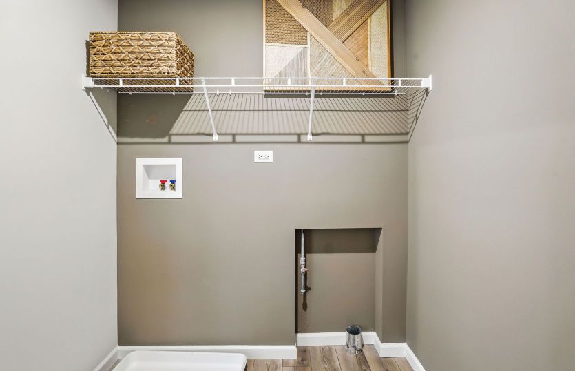 Laundry with upper shelving