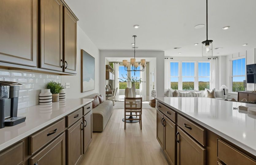 Kitchen Open to Gathering Room and Cafe