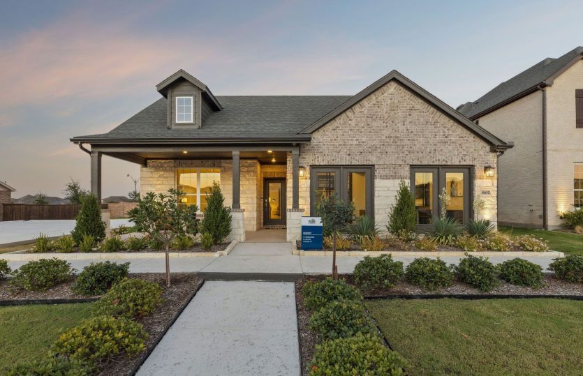 The Emory, a one-story home with 2-car garage, shown with Home Exterior 37