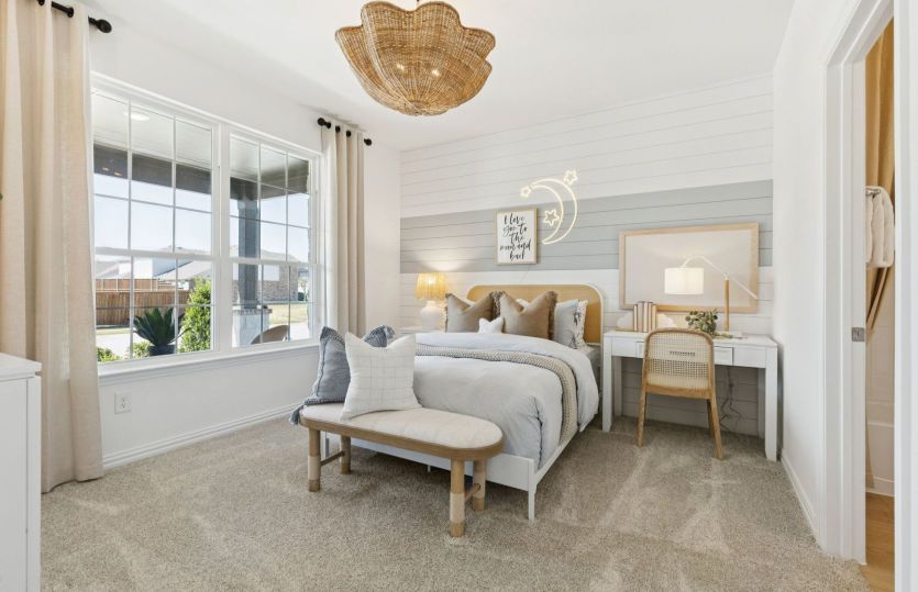 Secondary bedroom with large windows