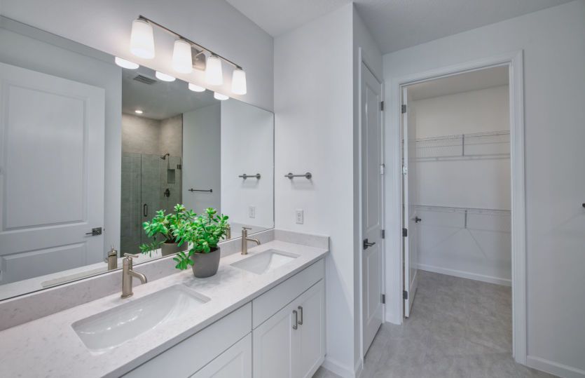 Owner's bathroom with dual sink vanity