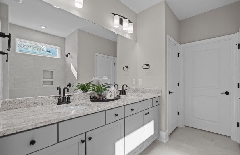 Owner's Bathroom. Model Home Representation.
