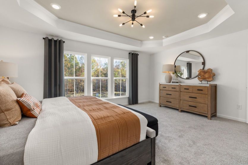 Light-Filled Owner's Suite is Roomy - Model Representation