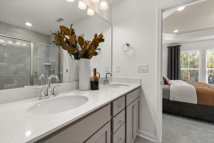 Owner's Bath has Dual Vanities - Model Representation