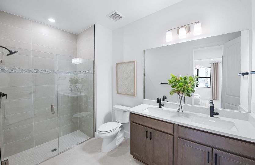 Owner's bathroom with dual sink vanity