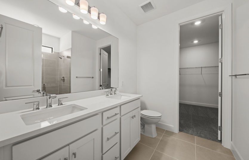 Owner's bathroom with dual-sink vanity