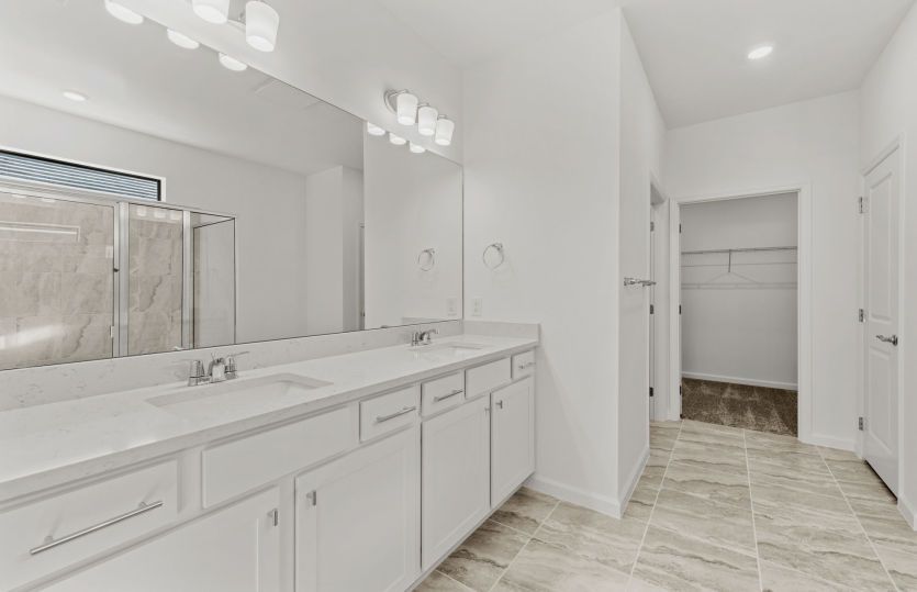 Owner's bathroom with dual-sink vanity
