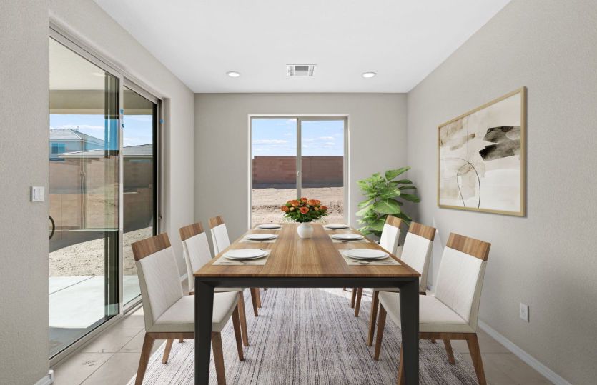 Sunlit cafe off the kitchen is the ideal space for family dinners or busy mornings.