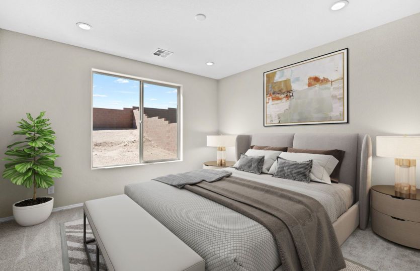 Spacious owner's suite with private bath.