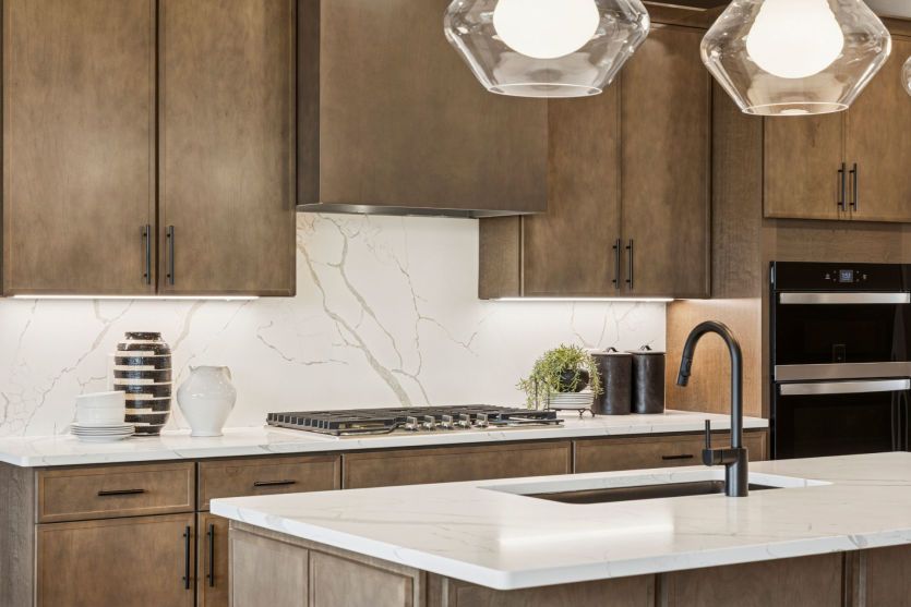 Chef-inspired kitchen with island.