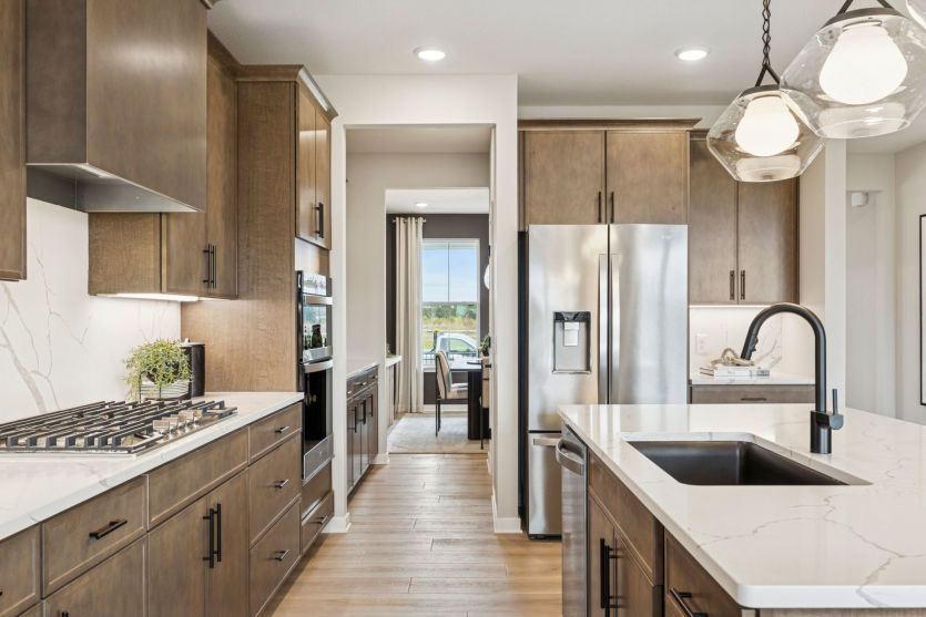 Chef-inspired kitchen with island.