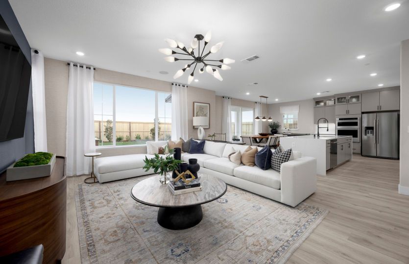 Gathering room open to kitchen and cafe area, perfect for entertaining