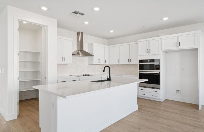 Kitchen with chef's appliance package