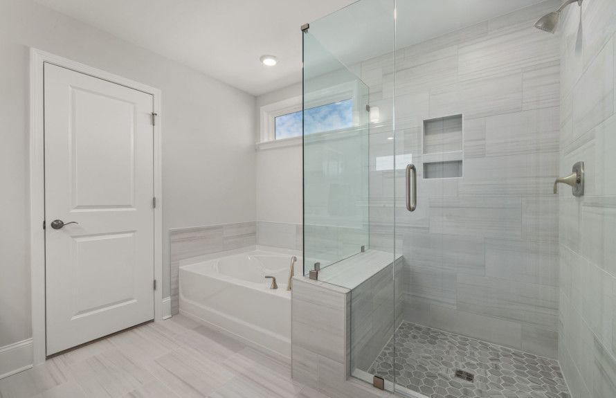 Owner's Bathtub & Glass Shower