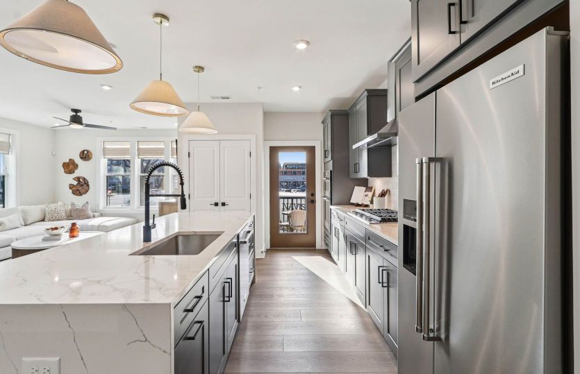 Gourmet Kitchen with Access to the Balcony