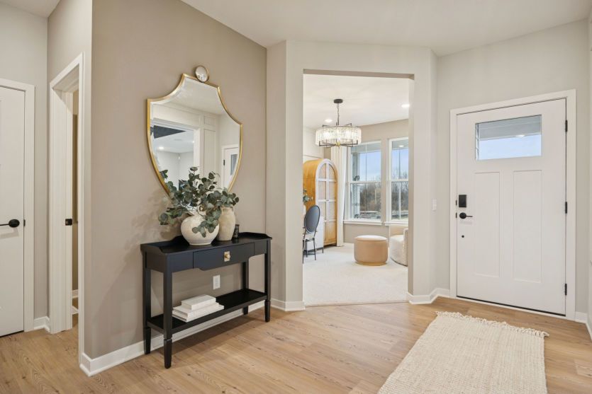 A welcoming foyer with beautiful finishes sets the tone for your home’s style and charm.