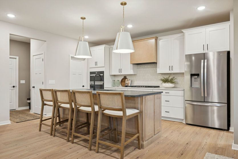 A chef’s dream kitchen with sleek appliances, a spacious island, and elegant finishes.