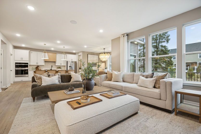 Bright, open spaces seamlessly connect living, dining, and kitchen areas for easy entertaining.
