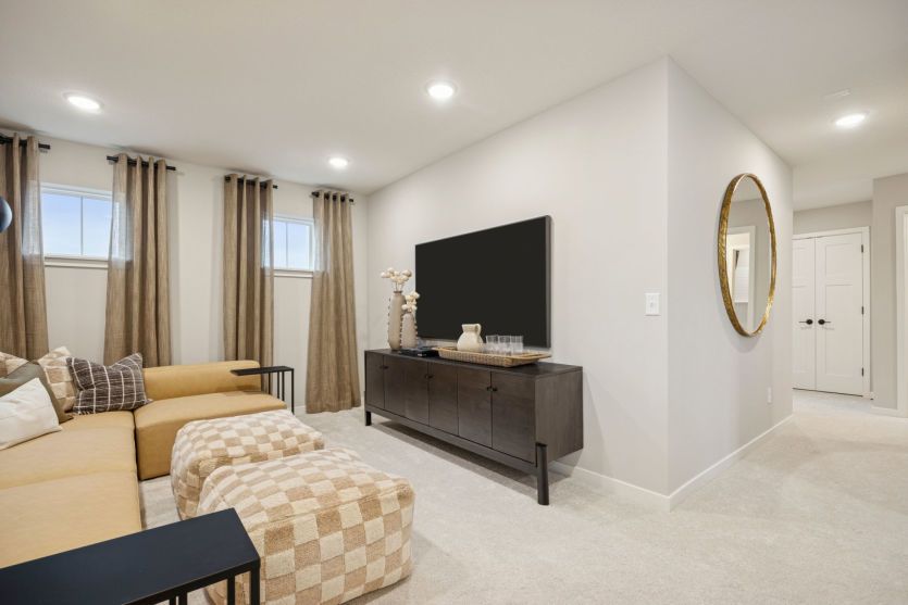 A flexible loft space ideal for movie nights, a playroom, or a quiet retreat.