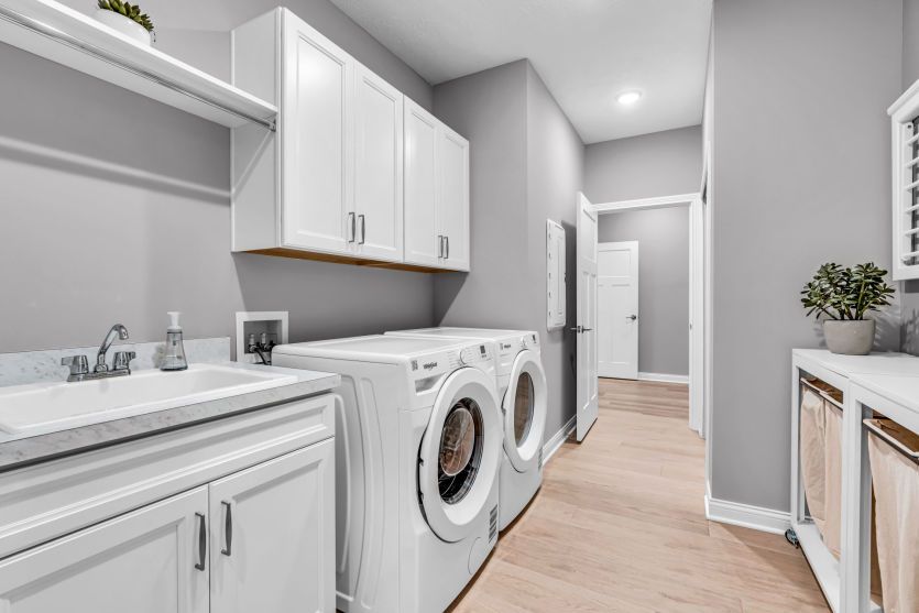 Large Laundry Room with Pass Thru to Owner's Closet