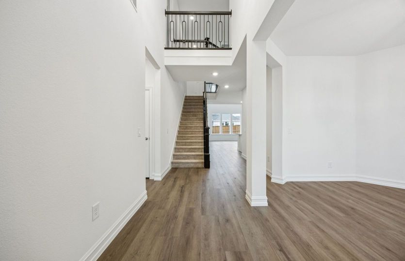 Welcoming entry into home with soaring ceilings *photos depict options and features that may not be available