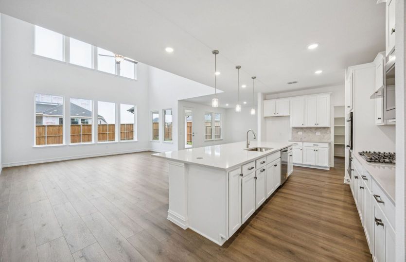 Open concept living with two-story ceilings *photos depict options and features that may not be available
