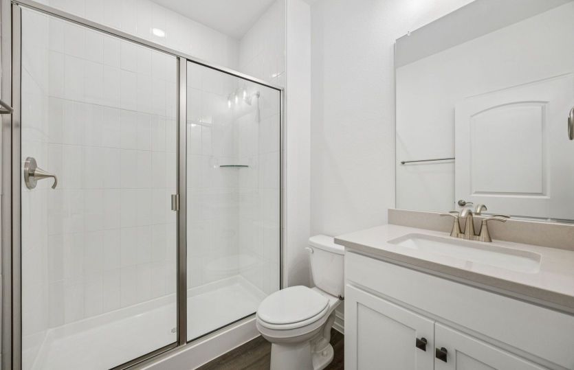 Secondary bathroom, located downstairs *photos depict options and features that may not be available