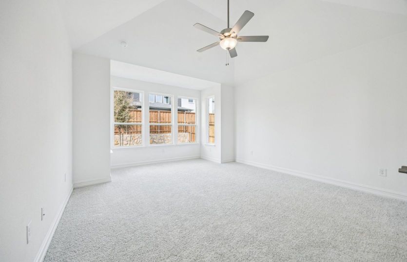 Spacious owner's suite showing optional vaulted ceiling