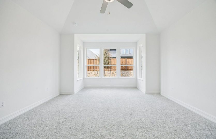 Private owner’s bedroom retreat in the Azle floorplan with spacious layout.
