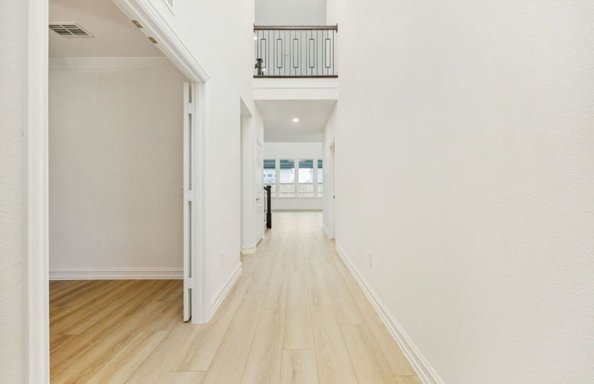 Welcoming entry with soaring ceilings *photos may depict options and features that aren't available