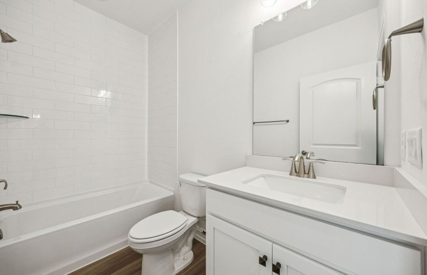 Well-appointed secondary bathroom with contemporary fixtures.