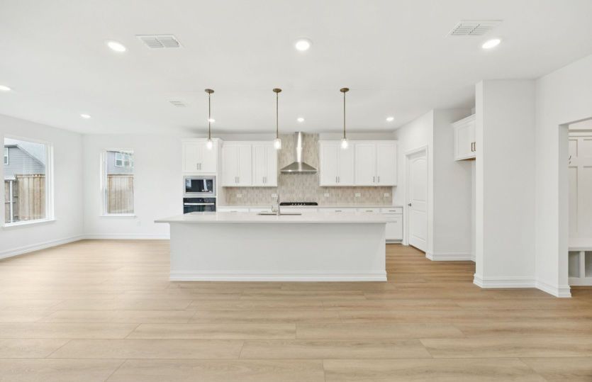 Spacious kitchen with eat-in island *photos may depict options and features that aren't available