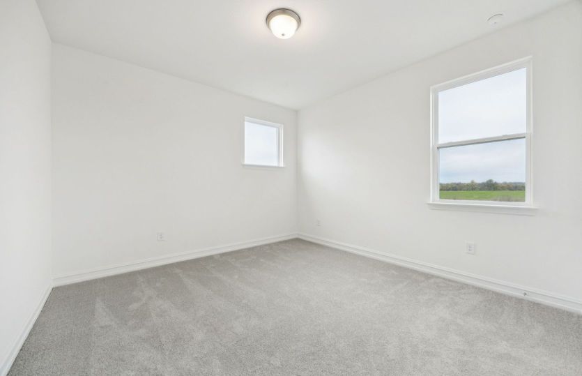 Secondary bedroom *photos may depict options and features that aren't available