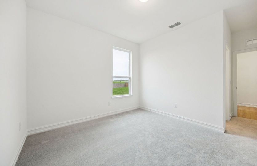 Secondary bedroom *photos may depict options and features that aren't available