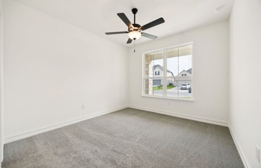 Secondary bedroom *photos may depict options and features that aren't available