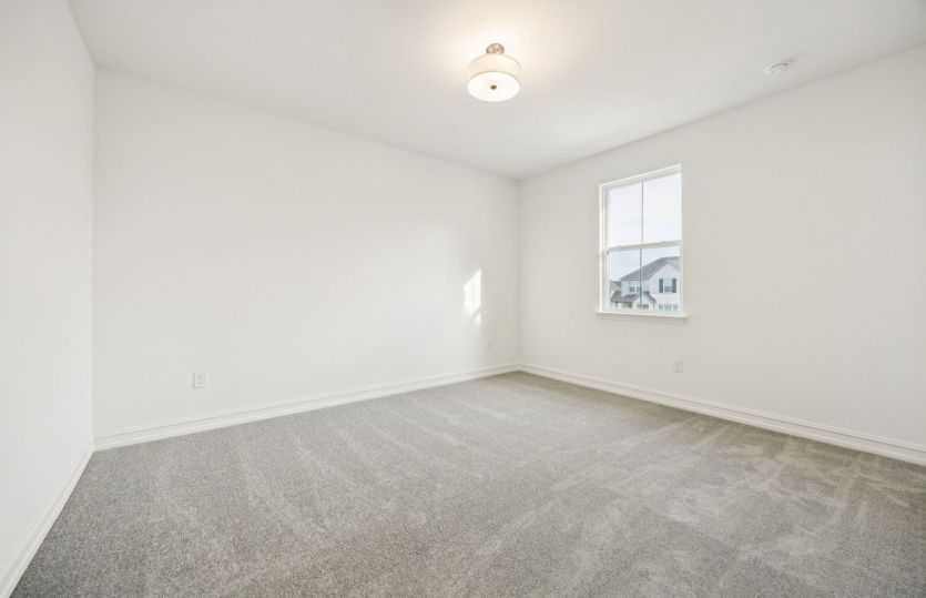 Secondary bedroom *photos may depict options and features that aren't available