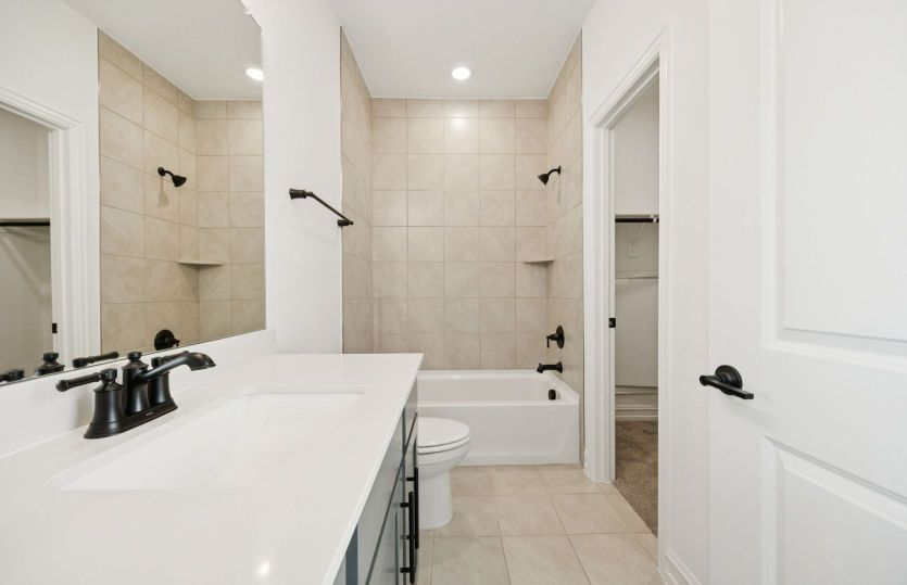 Spacious secondary bathroom *photos may depict options and features that aren't available