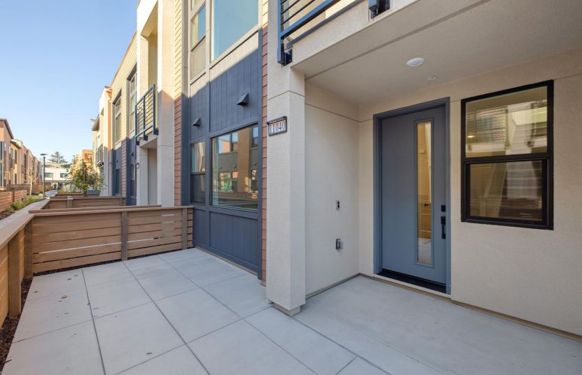 Fenced in front patio area