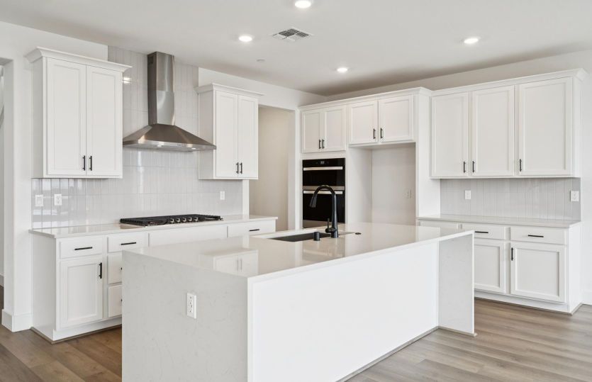 Kitchen with waterfall island