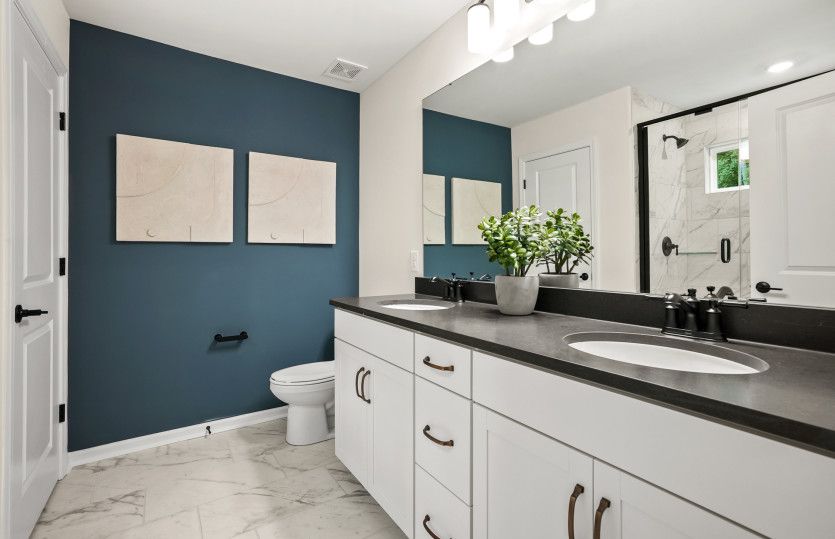 Owner's Bath with Dual Bowl Vanity and Walk-In Shower