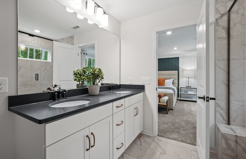 Owner's Bath with Dual Bowl Vanity and Walk-In Shower